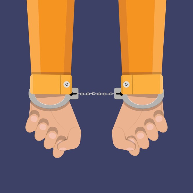 human hands in handcuffs